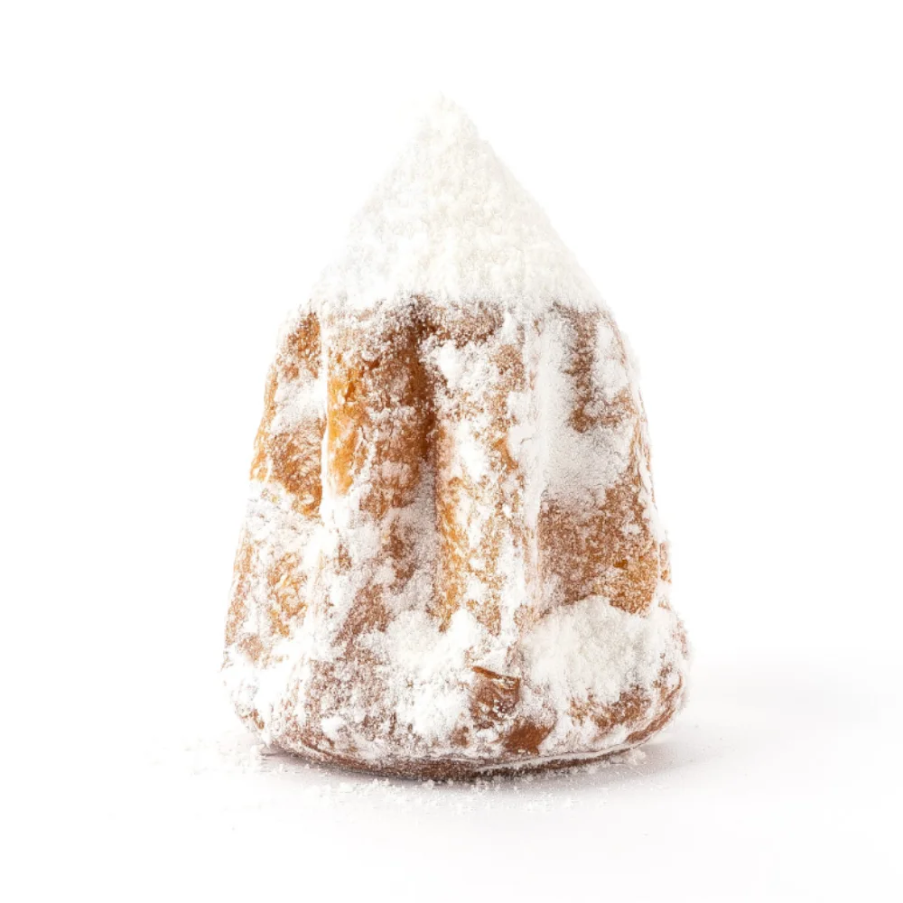 A tall pandoro covered in powdered sugar from Onion Anguk